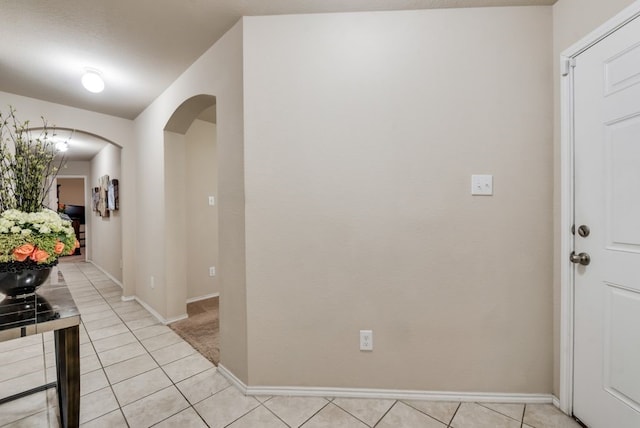 interior space featuring light tile patterned floors