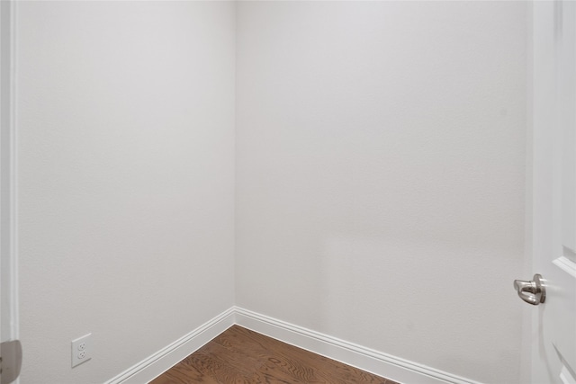 empty room featuring hardwood / wood-style flooring