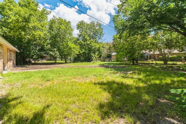 view of yard featuring fence