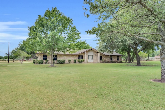 view of front of house with a front lawn