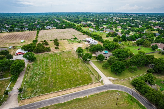 birds eye view of property featuring a rural view