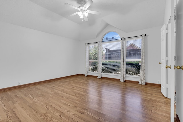 interior space featuring lofted ceiling, ceiling fan, and light wood-type flooring