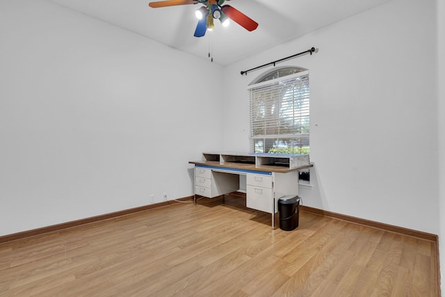 home office featuring light wood-type flooring and ceiling fan