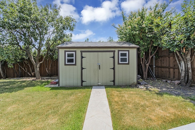 view of outdoor structure with a yard