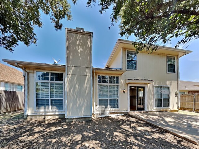 view of front of property with a patio