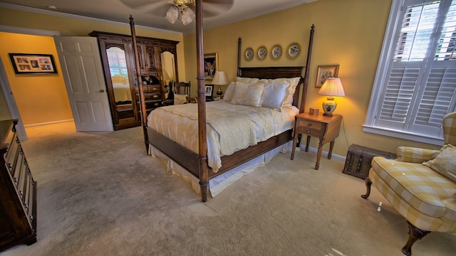 bedroom featuring multiple windows, ceiling fan, ornamental molding, and light colored carpet