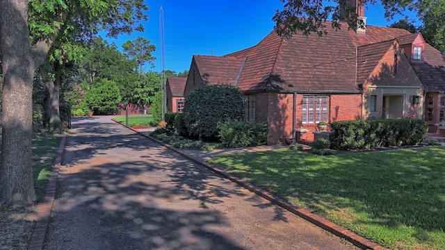 view of home's exterior featuring a lawn