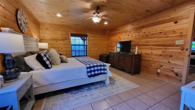 bedroom featuring light tile patterned floors, ceiling fan, recessed lighting, wood walls, and wood ceiling