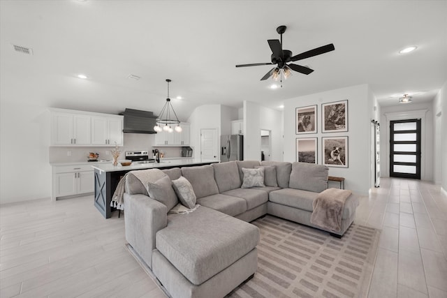 living room featuring ceiling fan