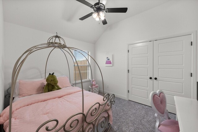 bedroom featuring carpet floors, ceiling fan, lofted ceiling, and a closet