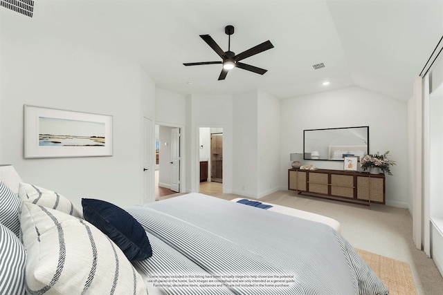 carpeted bedroom with ceiling fan, connected bathroom, and vaulted ceiling