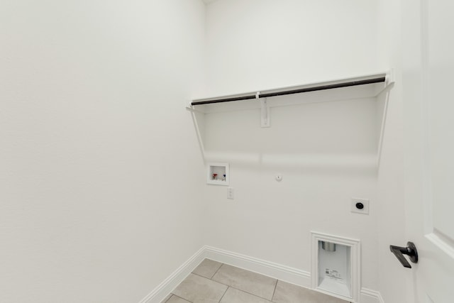 laundry room featuring washer hookup, hookup for an electric dryer, hookup for a gas dryer, and light tile patterned flooring