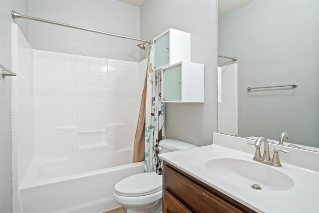 full bathroom with toilet, shower / bath combination with curtain, and vanity