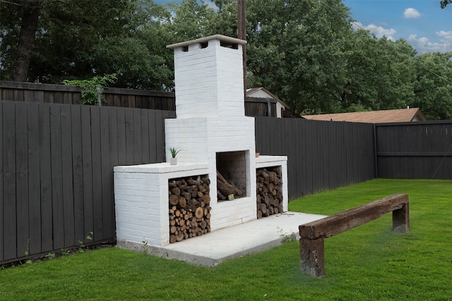 exterior space featuring a fireplace