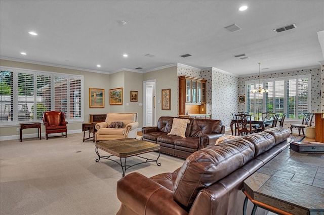 carpeted living room featuring crown molding, a wealth of natural light, and an inviting chandelier