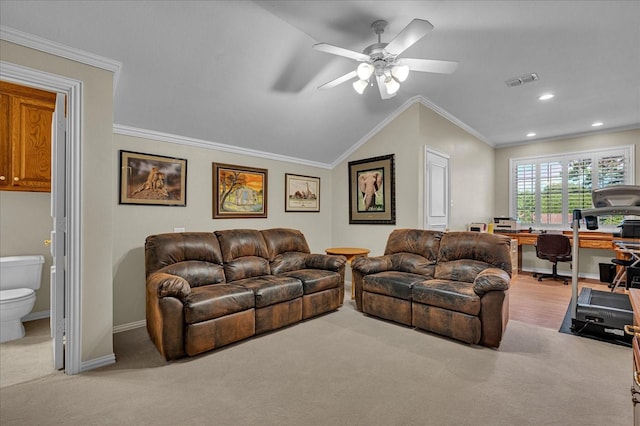 carpeted living room featuring lofted ceiling, crown molding, and ceiling fan