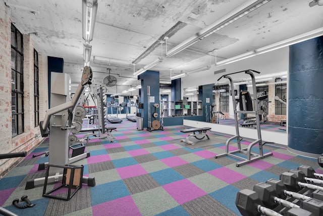 exercise room featuring carpet flooring