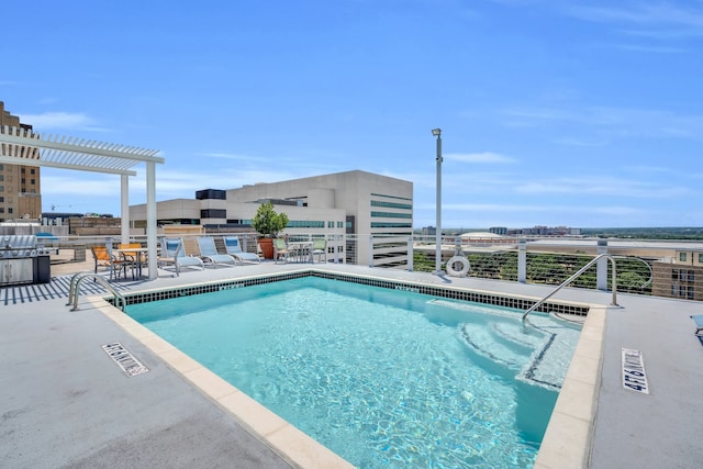 view of pool with a pergola