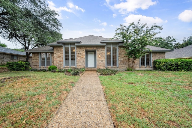 view of front of house with a front yard