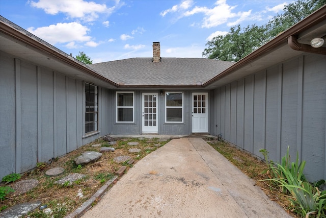 property entrance with a patio area