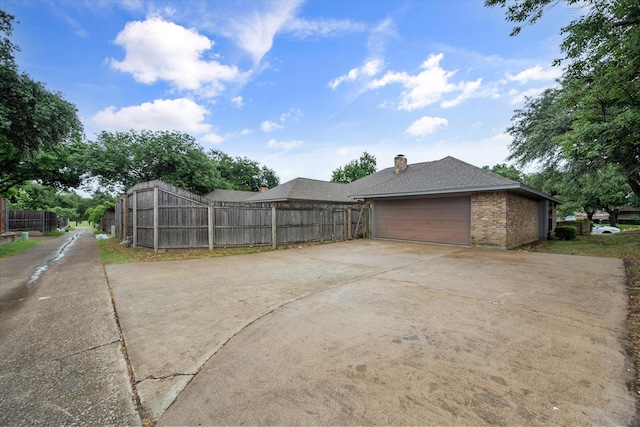 view of yard featuring a garage