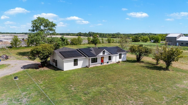 birds eye view of property featuring a rural view