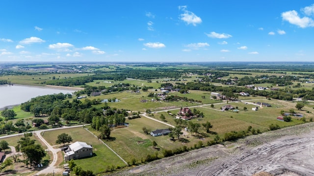 bird's eye view featuring a water view and a rural view