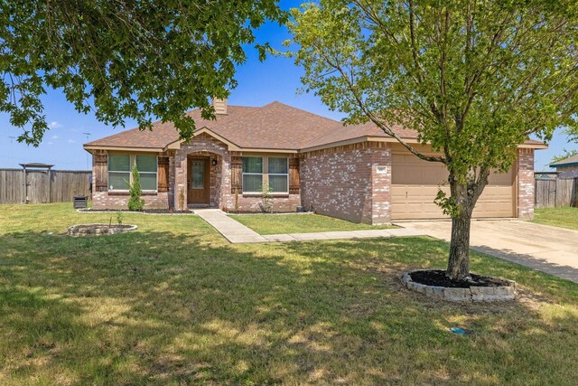 view of front of property with a garage, central air condition unit, and a front yard