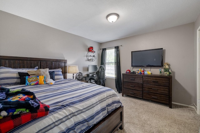 carpeted bedroom with a textured ceiling