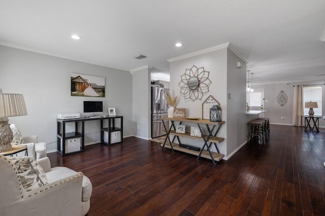 living room with dark wood-type flooring and crown molding