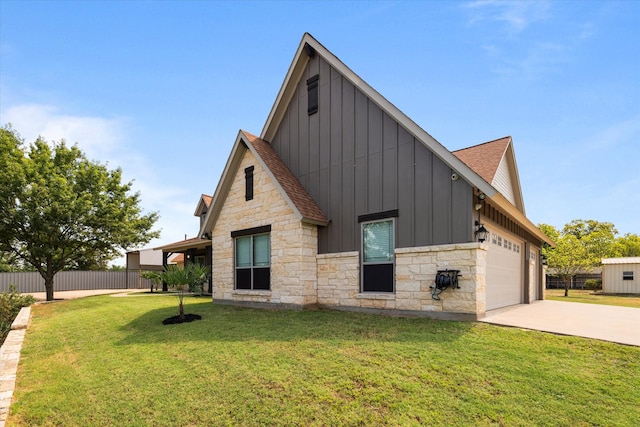 exterior space with a garage and a front lawn