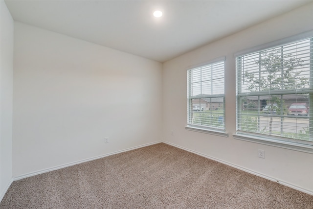 view of carpeted spare room