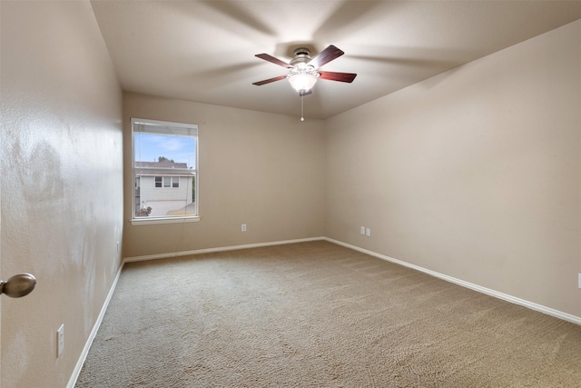 unfurnished room featuring carpet flooring and ceiling fan