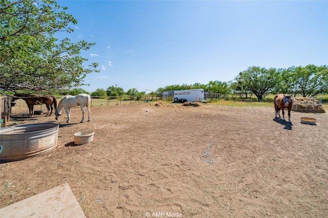 view of yard featuring a rural view