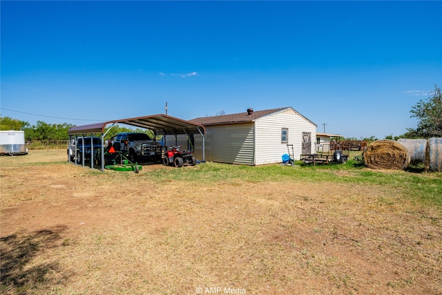 view of yard featuring a carport