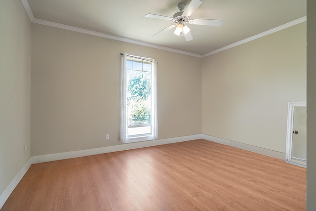 spare room featuring ornamental molding, light hardwood / wood-style floors, and ceiling fan