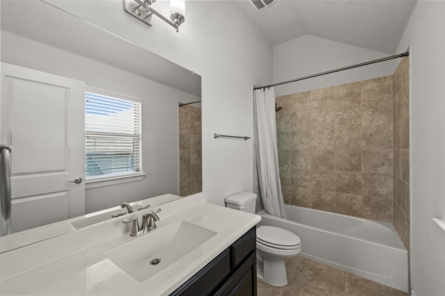 full bathroom featuring toilet, vanity, tile patterned floors, and shower / bathtub combination with curtain