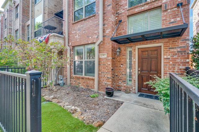 property entrance with a balcony