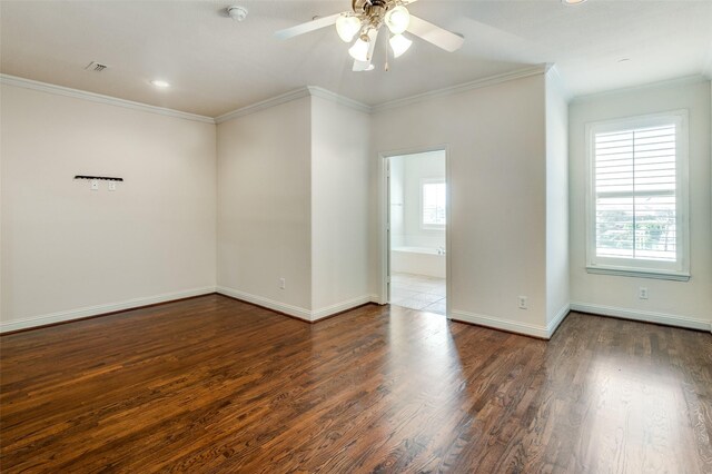 spare room featuring crown molding, hardwood / wood-style floors, and ceiling fan