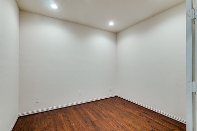 empty room featuring hardwood / wood-style flooring