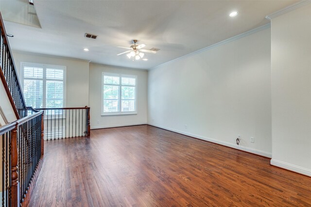 unfurnished room featuring ornamental molding, dark hardwood / wood-style flooring, and ceiling fan