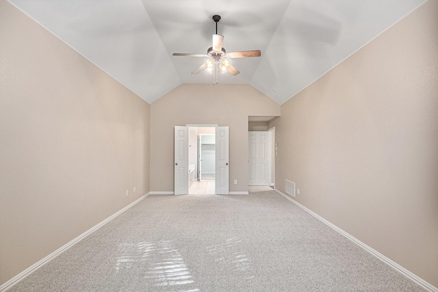 interior space with ceiling fan and lofted ceiling