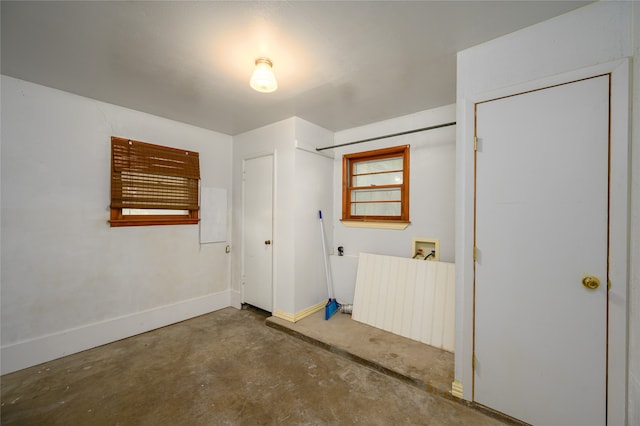 interior space with radiator heating unit and concrete floors