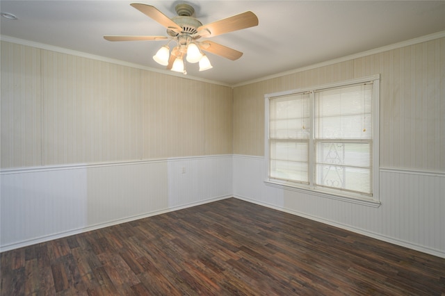 empty room featuring wood-type flooring, ornamental molding, and ceiling fan