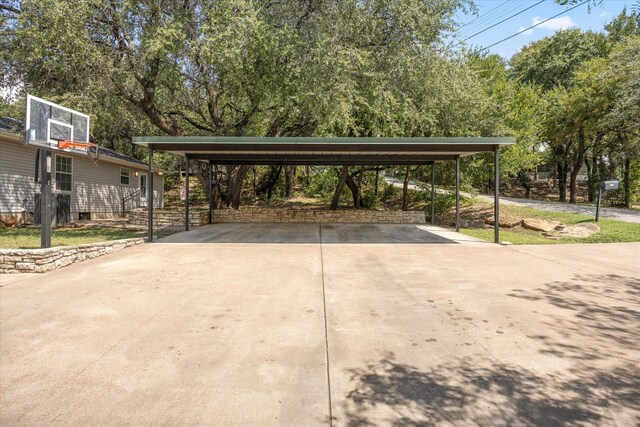 view of parking / parking lot with a carport