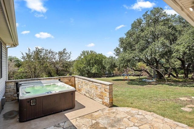 view of patio with a hot tub