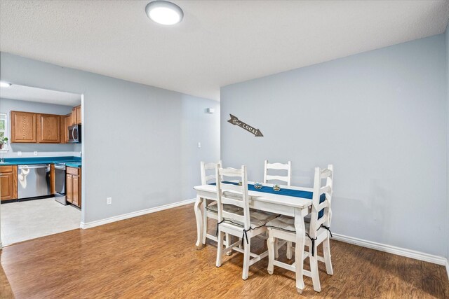 dining room featuring light hardwood / wood-style floors