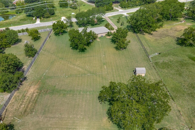 drone / aerial view with a rural view and a water view