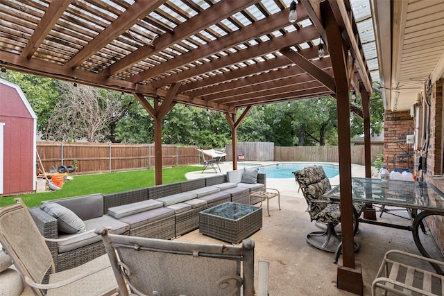 view of patio / terrace featuring a fenced in pool, a storage unit, an outdoor hangout area, and a pergola