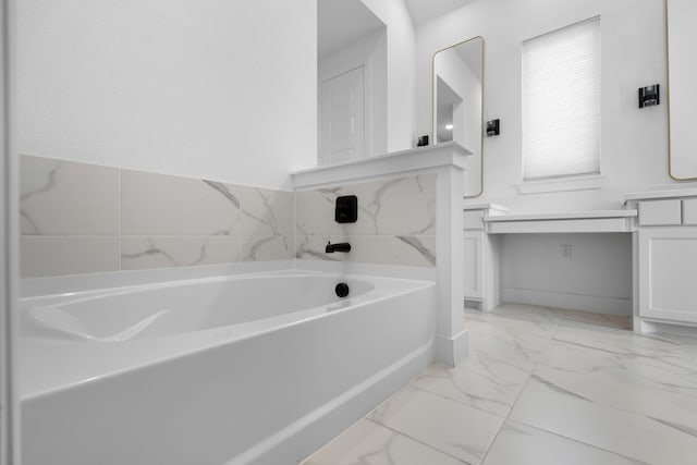 bathroom featuring a bathtub and vanity